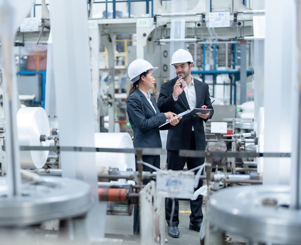 Integrator Program - Corporates discussing in factory